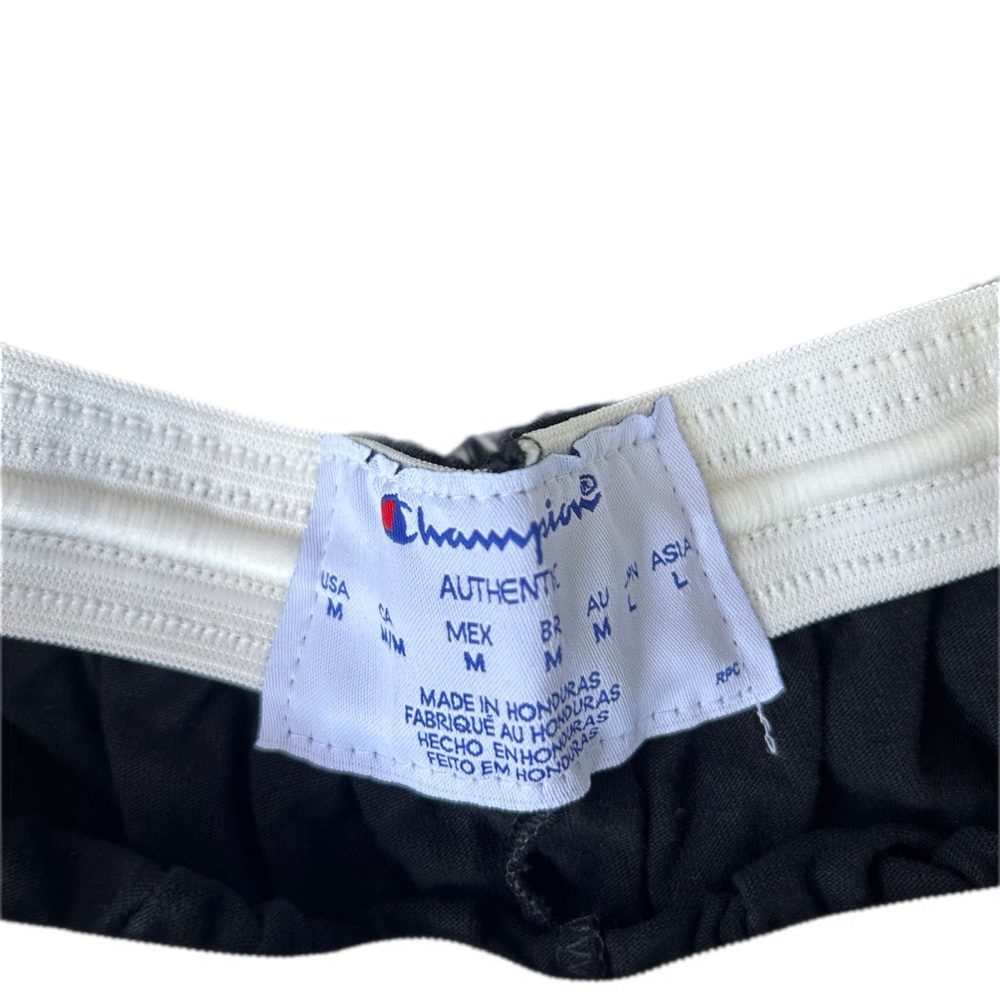 Champion Black Athletic Shorts with Red and Yellow Accents - Picture 2 of 2